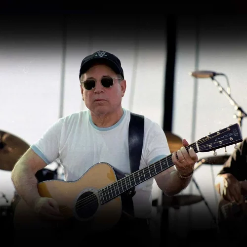 a man playing a guitar